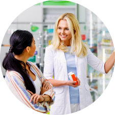 a female pharmacist with a female customer